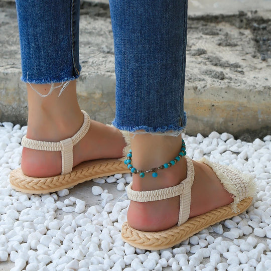 Platte sandalen met kwastjes voor vrouwen